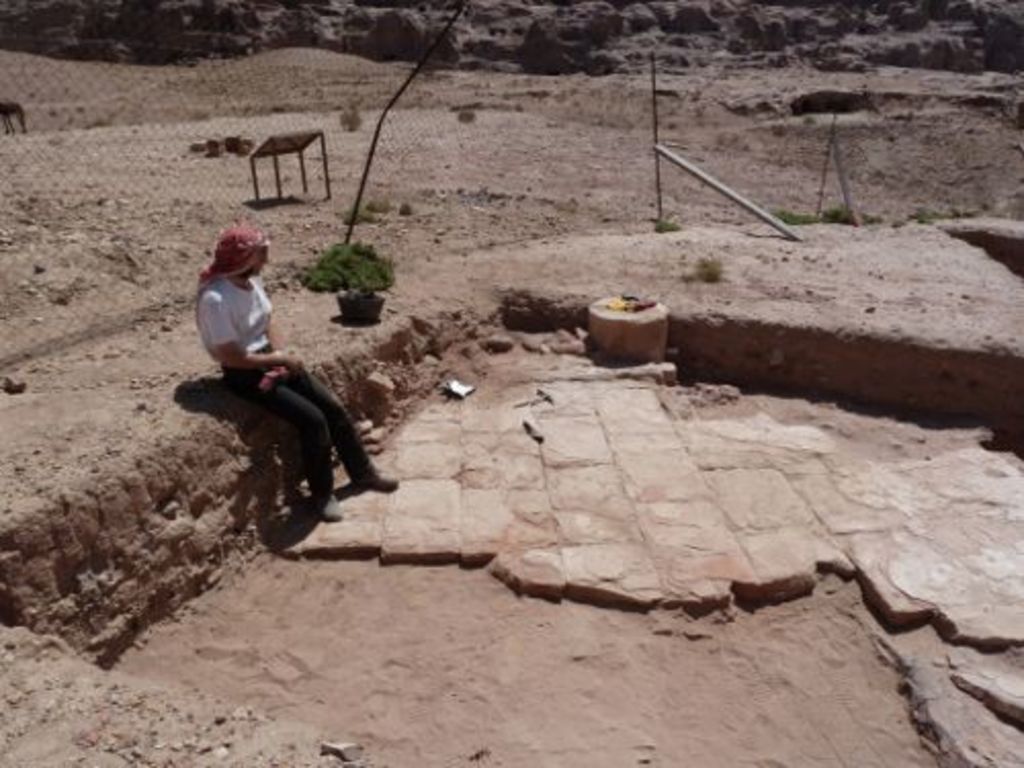 Fig. 16: Bernhard Kolb admiring Nabataean floor slabs (photo: S. G. Schmid)