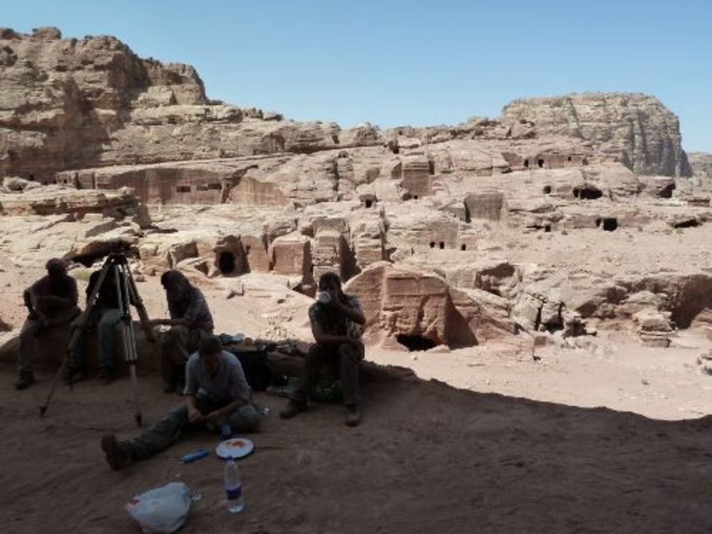 Fig. 18: Part of the Khubta team during breakfast in front of the beautiful skyline of Petra (photo: S. G. Schmid)