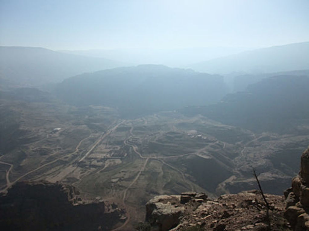 Misty view from Umm el-Biyara towards the Petra city center an the Outer Siq (photo: A. Barmasse)