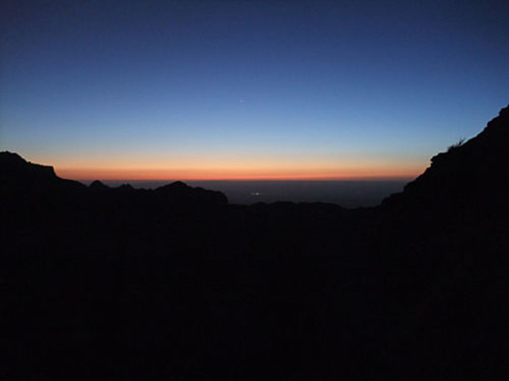 Sunset over the Wadi Araba as seen from the camp cave on Umm el-Biyara (photo: A. Barmasse)