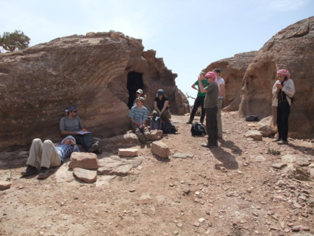 Fig. 7: The team resting in the area of the cave and camping site.
