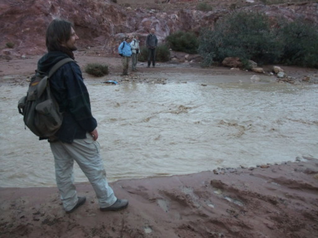 Fig. 40: Guido Teltsch separated from the rest of the team by a wild water gushing wadi.