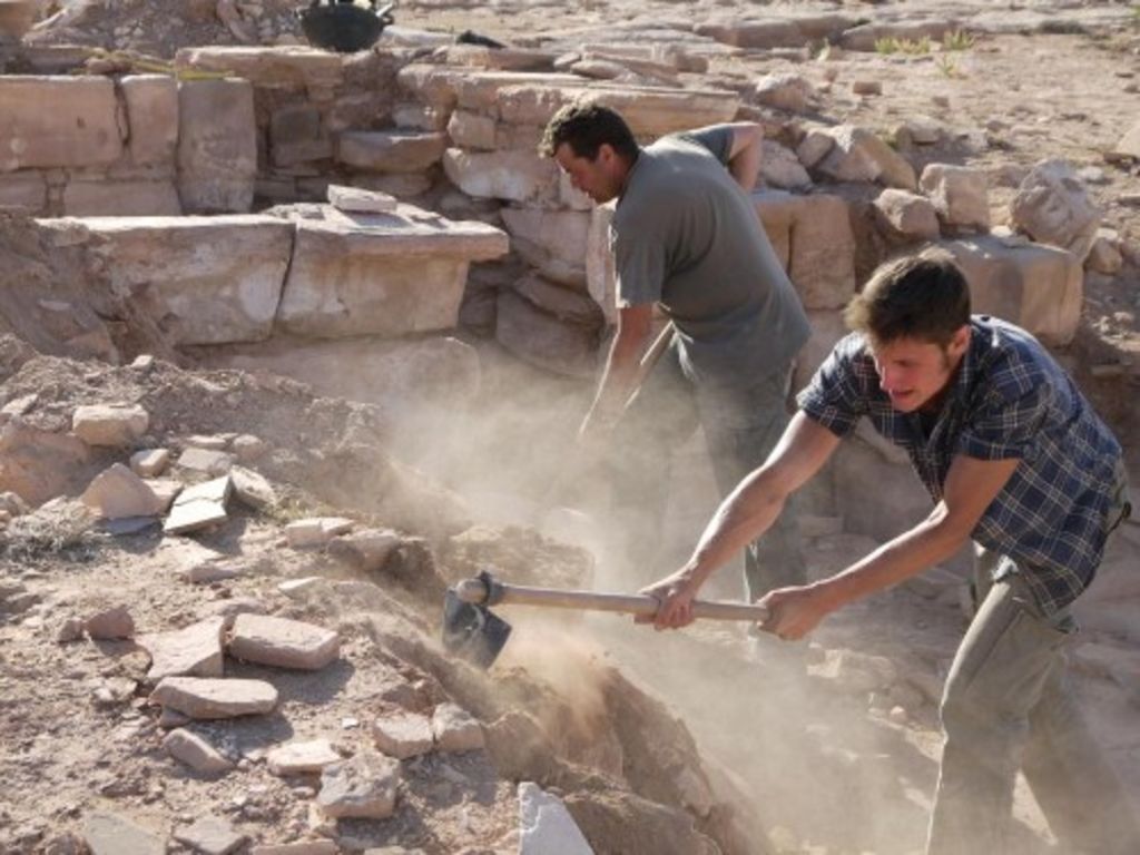 Fig. 65: Stephan Schmid and Will Kennedy covering the floor slabs in Morton’s trench.