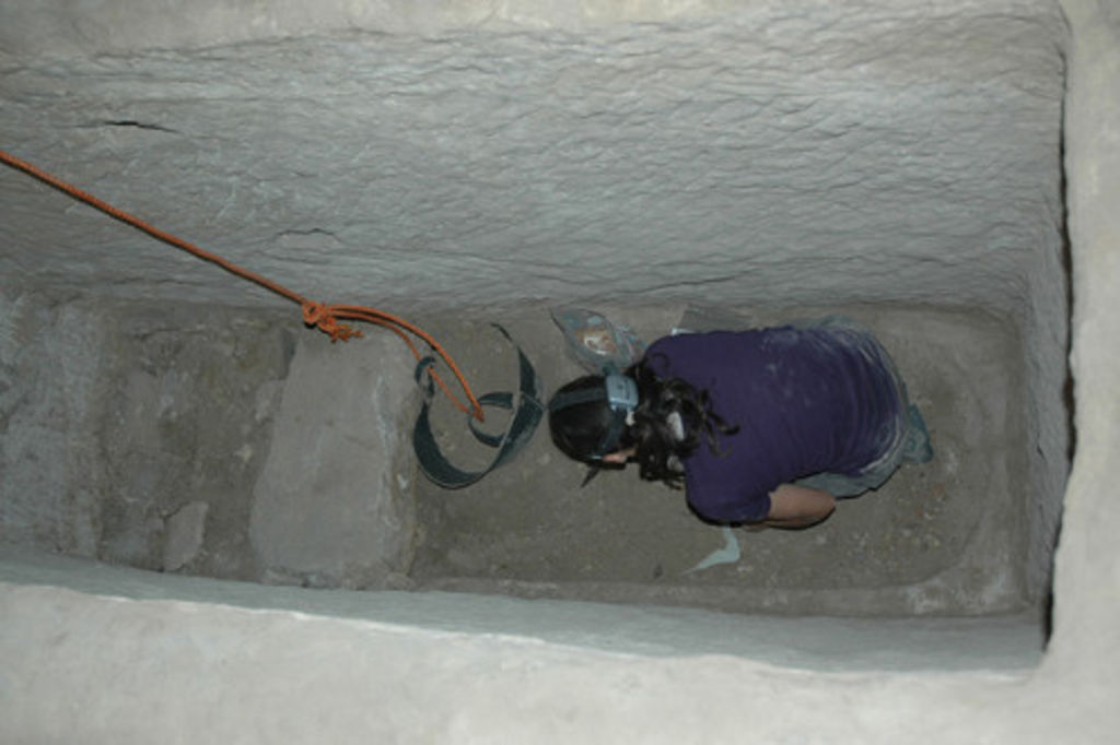 Fig. 69: Aurélie Guet digging her way down towards the bottom of the shaft grave.