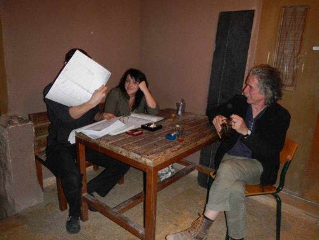 Fig. 15: Will Kennedy (hiding behind a very beautiful drawing), Polly Agoridou and Andreas Voegelin trying to make sense of last years documentation.