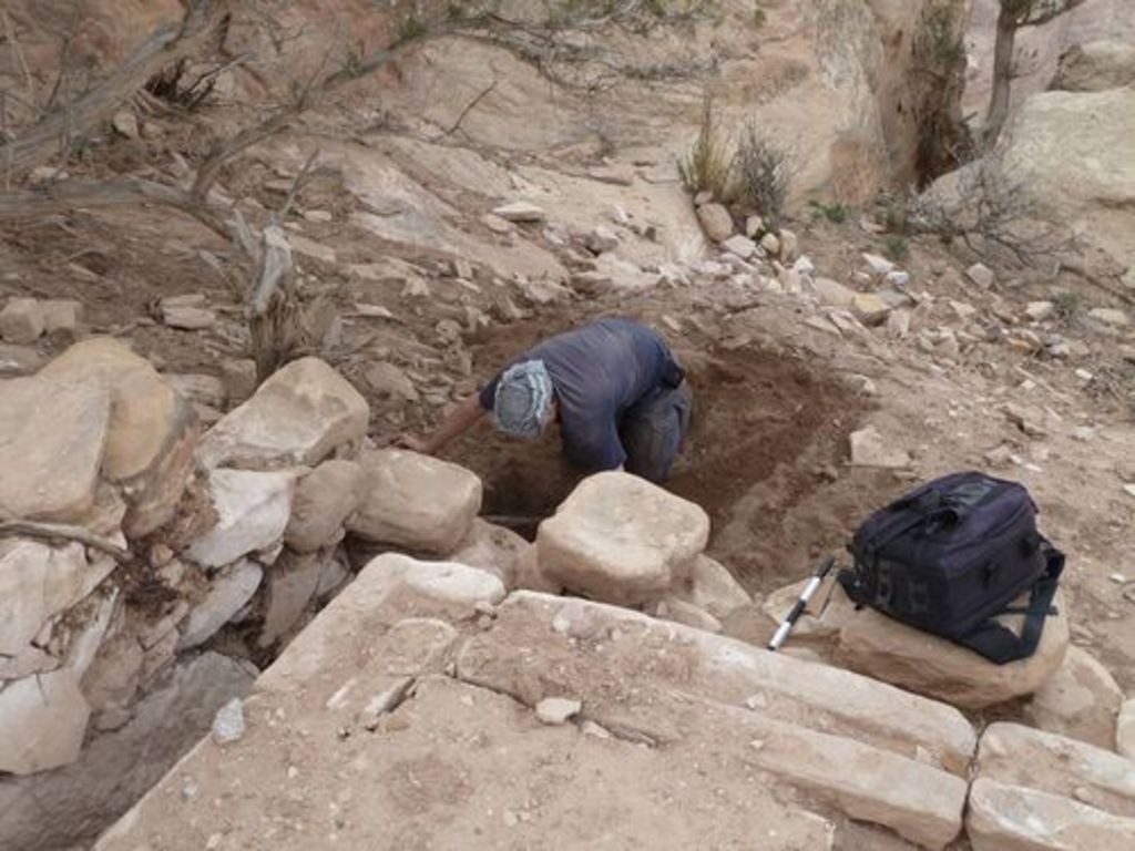 Fig. 23: Stephan Schmid starting excavating at the outflow of the defecation channel of the latrine excavated in 2011. What exactly does he hope to find there?