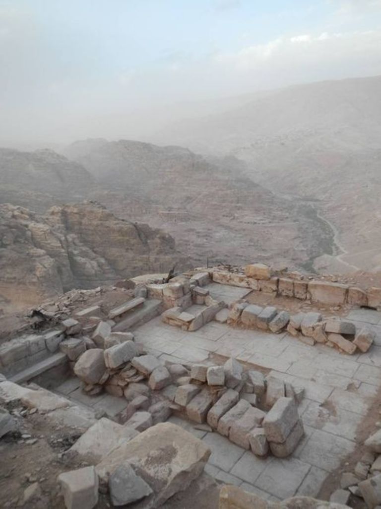 Fig. 68: Isn’t this an extremely beautiful working place? The main hall of the bathing installation on Umm al-Biyara, overlooking Petra. Clearly visible are the collapsed remains of two arches that once supported the roof.