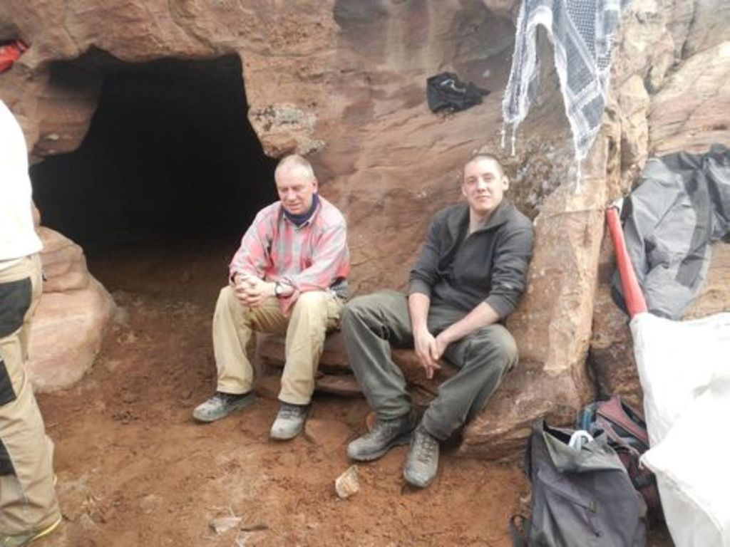 Fig. 15: Christoph Schneider (left) and Will Kennedy (right) testing the improved seat in front of the cave