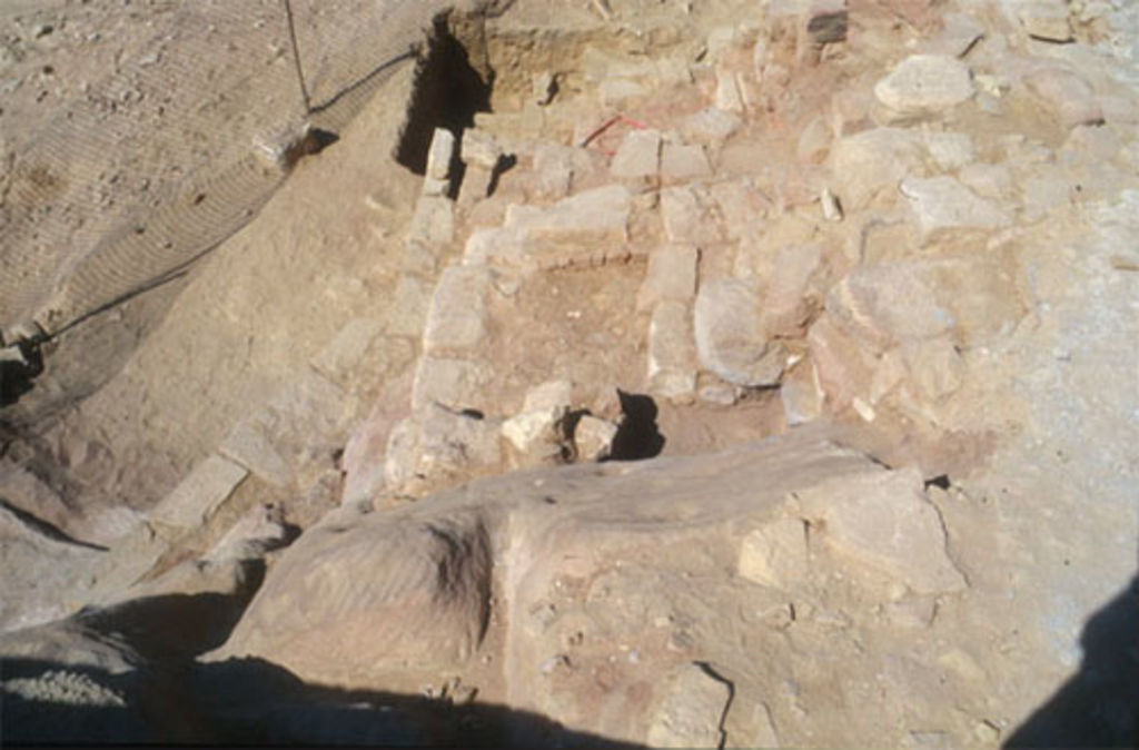 Fig. 15: View from room 10 of wall BX (left half of picture) and the foundations of room 52 (photo: D. Keller)