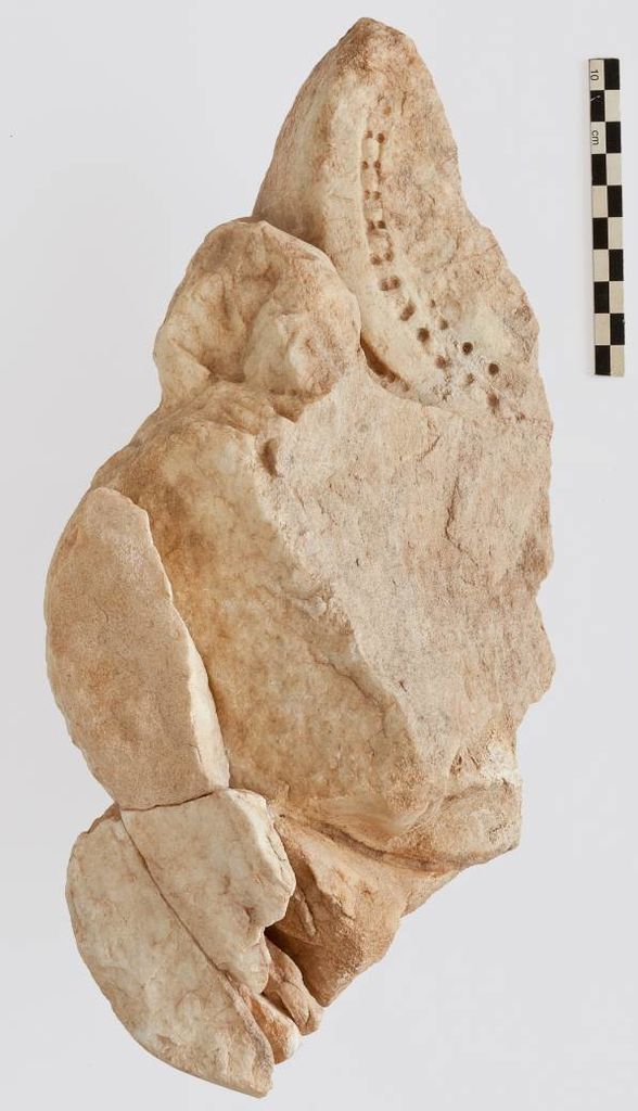 Fig. 24: ST 20, back head of a marble statue with a water jar, from main hall (photo: A. Voegelin)