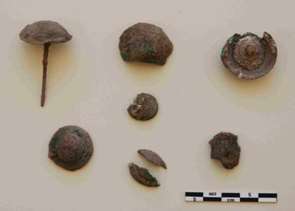 Fig. 7: Room 3, bronze elements from the decoration of a wooden furniture (photo: S. G. Schmid)